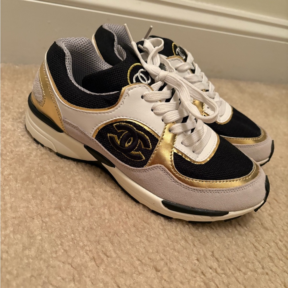 CHANEL Women's Black, White, and Gold Sneakers